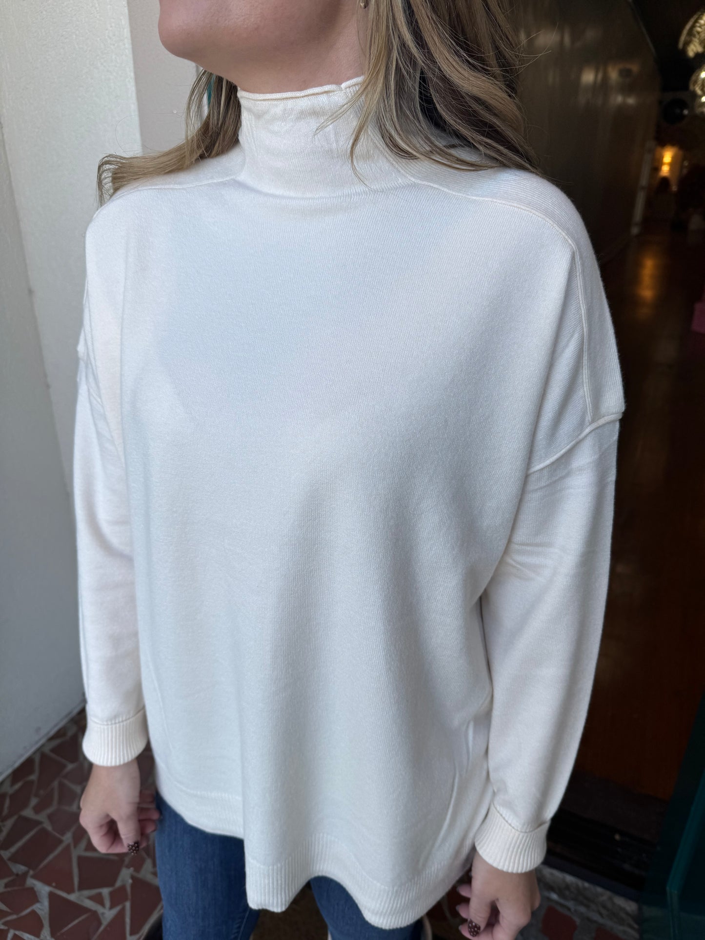 Rolled Raw Edge High-neck Sweater